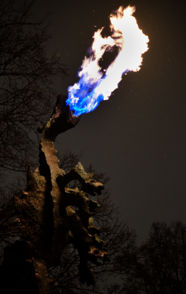 A fire-spitting statue of a dragon.